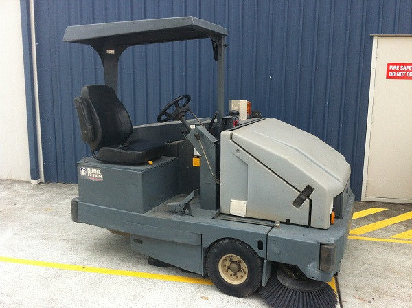 Nilfisk-Advance SR1800 Rider Sweeper Now REPLACED BY Nilfisk SW8000 - TVD The Vacuum Doctor